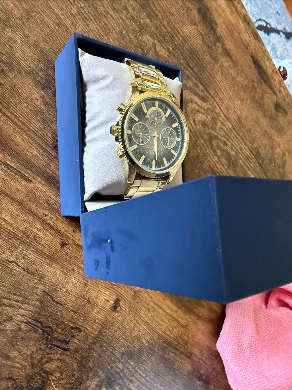 Gold Tone Chronograph Watch With Black Dial